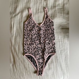 Aura pink and black cheetah bodysuit